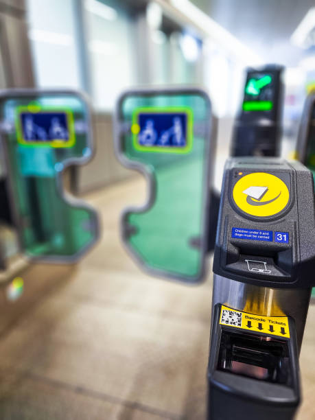 istock Contactless payment device at ticket barrier on British railway station 2198722678