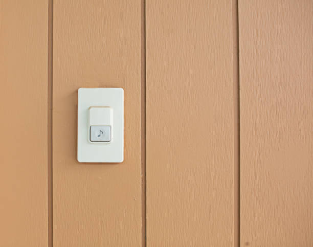 istock The bell switch is mounted on a brown painted wooden wall. 2198722913