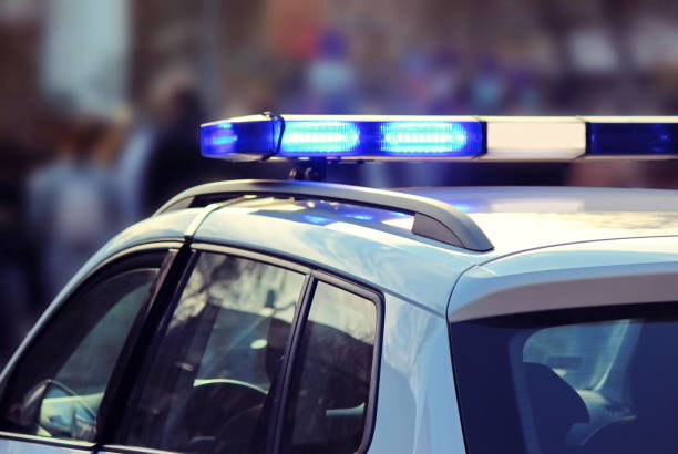 istock Police car on the street 2198726141