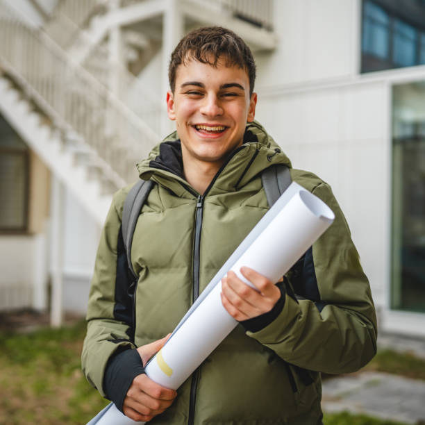 istock student walk outdoor with backpack white paper in front school building 2198726239