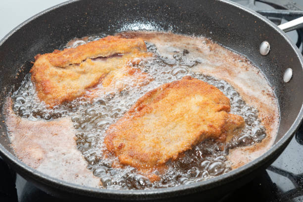 istock Cachopos being made, Beef with goat cheese and ham Breaded and fried... Delicious! typical meal from Cantabria, Spain. 2198726402