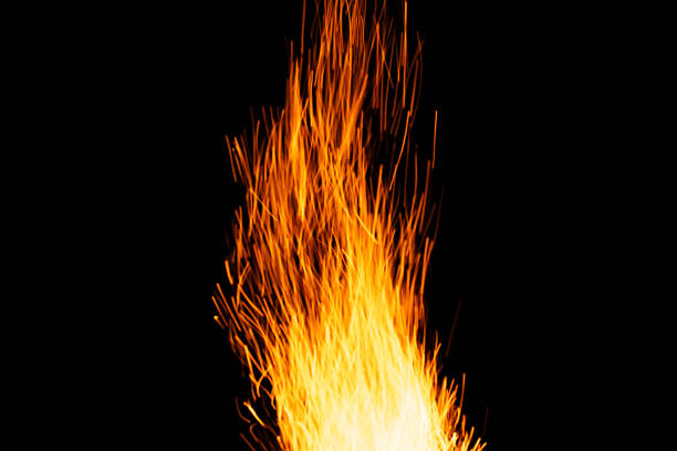 istock sparks from the fire glowing in the dark 2198726682