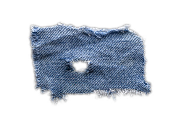 istock jeans. a frayed and torn piece of denim rag 2198726692