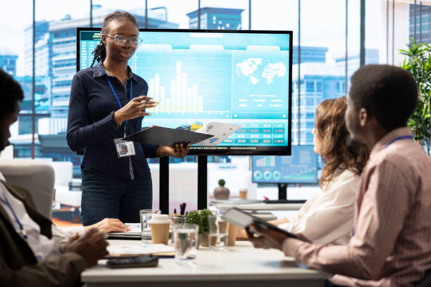 istock Group of business associates discussing project development plans 2198727942