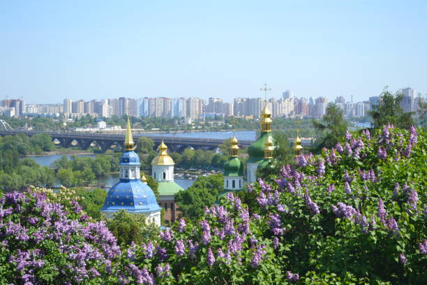 istock Church domes in lilac blossom 2198728061