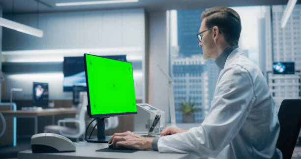 istock A Male Scientist in a White Lab Coat Works on a Green Screen Computer in a Advanced Medical Lab, Focusing on Advanced Healthcare Research and Analysis in a High-tech Hospital Environment 2198728774
