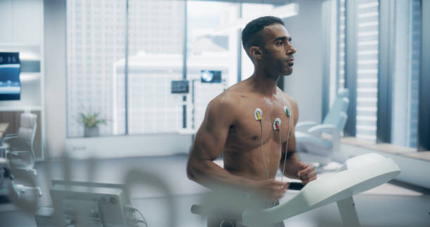 istock Athlete Performs Treadmill Exercise Test in a High-tech Medical Lab, Monitored by Sensors, Showcasing Advanced Fitness Evaluation and Health Monitoring 2198728927