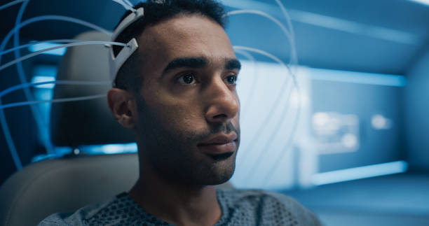 istock Futuristic Laboratory Research: Portrait of a Patient Wearing Advanced Eeg Headset. Static Close-up Shot. Advanced Science, Medicine, and Cognitive Innovation Technology. Virtual Reality Connection 2198730212