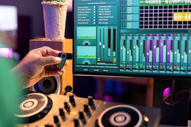 istock Musical producer using usb stick to edit old audio files on production software 2198731995