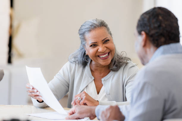 istock Happy Senior Couple Discussing Financial Documents Together 2198733740