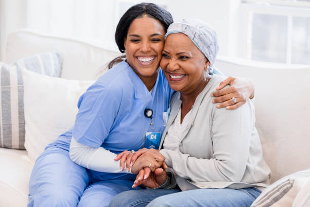 istock Emotional Support: Nurse and Patient Sharing a Tender Moment 2198733823