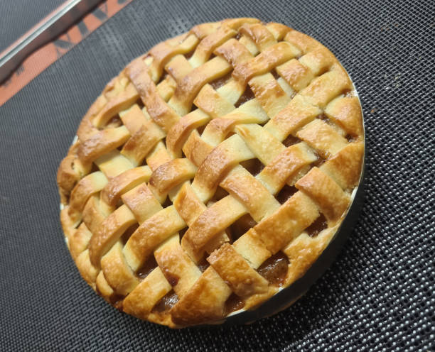 istock A freshly baked lattice pie sits on a textured surface, highlighting its golden-brown crust and inviting aroma 2198733915