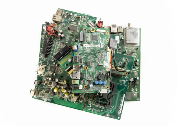 istock Electronic waste of main board computer - old TV circuit boards from recycle industry isolated on white background 2198735300