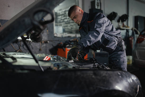 istock Mechanic Using Equipment to Test Car Power System 2198736075