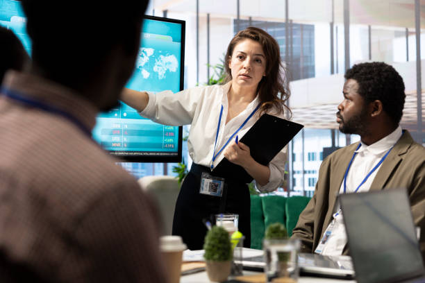 istock Corporate associates looking into project details and timetables 2198736100