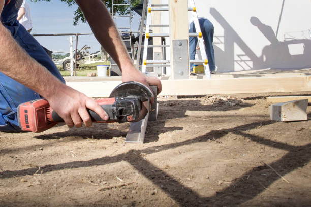 istock Using a grinder to cut through a piece of metal 2198737272