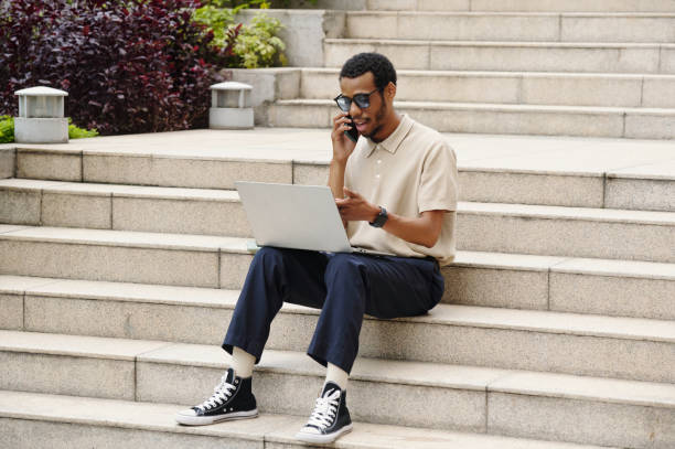 istock Businessman Working On Laptop In The City 2198739349