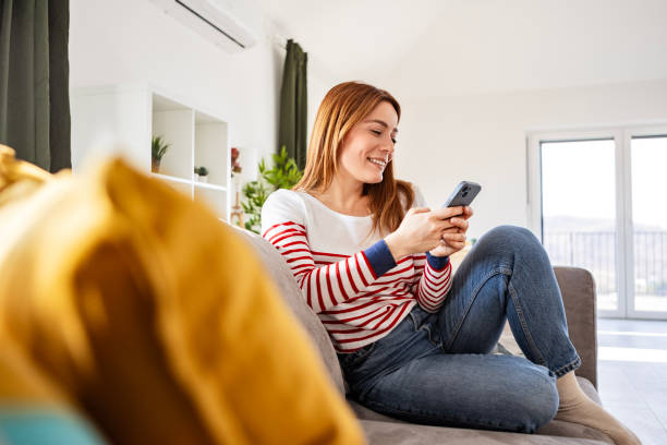 istock Woman Using Online App on Phone 2198739987