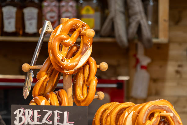 istock Fresh Pretzels on Wooden Stand at Bakery 2198740368