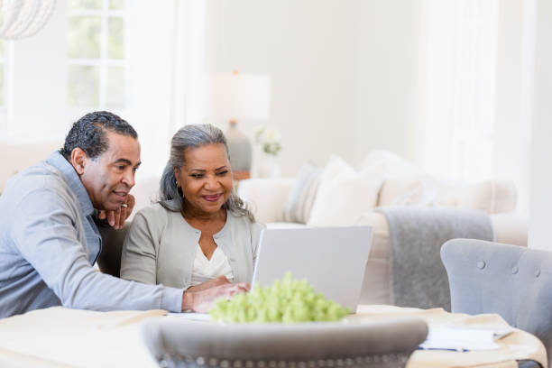 istock Senior Couple Using Laptop Together at Home, Retirement Planning 2198740630