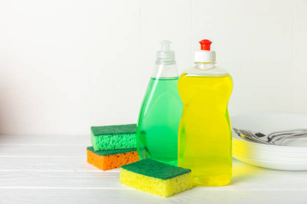 istock Colorful dish sponges on background. Kitchen sponge. Cleaning concept, cleaning service. Dishwashing liquid with clean and dirty dishes plate. Place for text, copy space. Wash the dishes. 2198743901