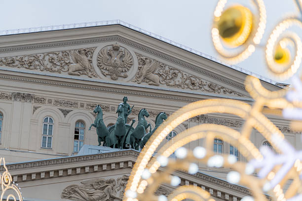 istock Historic building with equestrian sculptures and decorative lights at dusk 2198744805