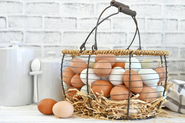 Fresh farm eggs in a basket on the kitchen counter