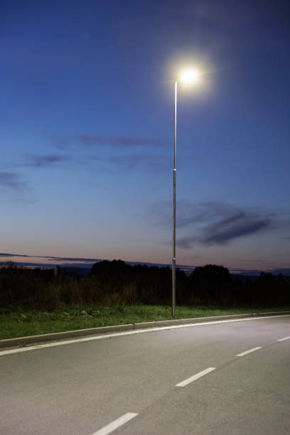 istock motorway at dusk with moder stret illumination 2198750444