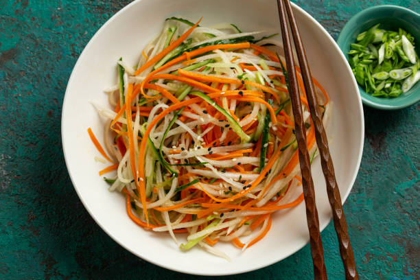istock cucumber, carrot and daikon radish salad 2198750598