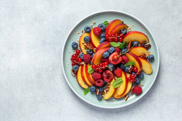 istock fresh healthy fruits and berries salad 2198750664