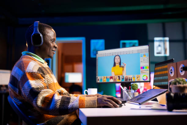 istock Black man photo editor in a well organized workspace editing images 2198758016