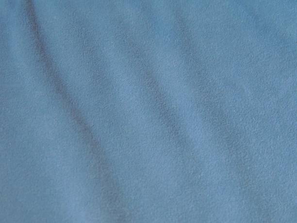 istock soft wavy texture of blue velvet fabric 2198759724