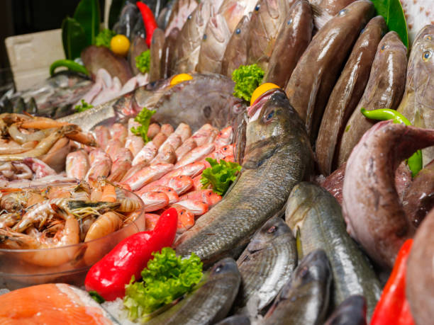 istock Fresh fish on the fish market counter. 2198760429
