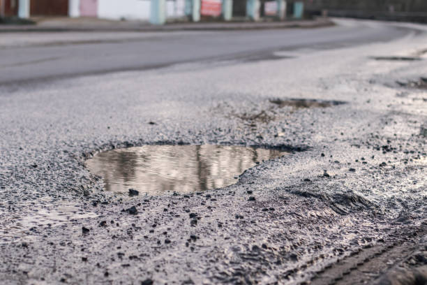 istock Terrible condition of the road surface 2198761668