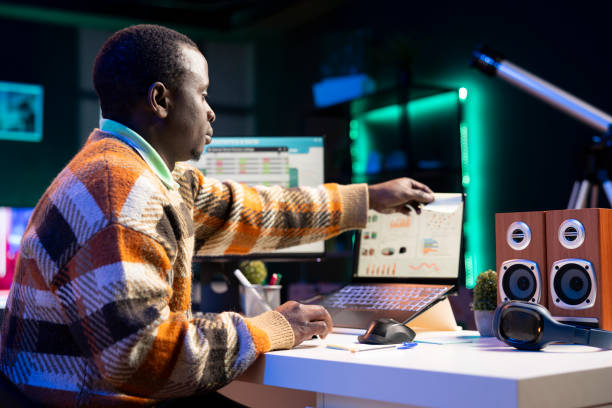 istock African american consultant sticking a memory note on his laptop screen 2198767690