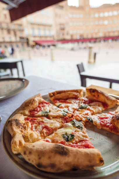 istock Pizza margarita in a restaurant 2198768679
