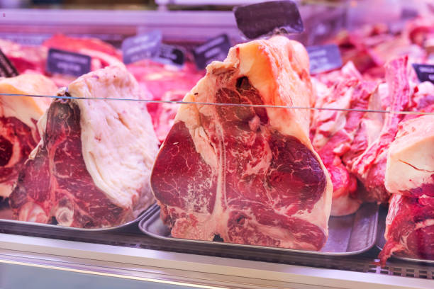 istock T-bone steak in a butcher shop 2198769164