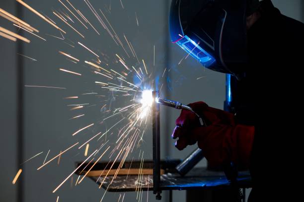 istock A man learns the craft of welding on a sample. 2198771247
