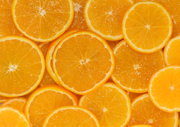 istock Bright orange slices arranged artistically create a vibrant display of fresh fruit goodness 2198772043