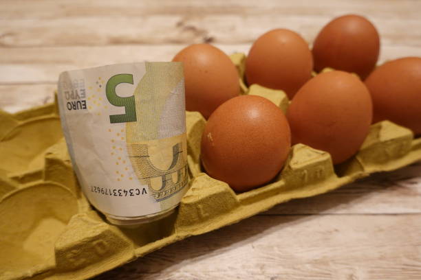 istock Five euro banknote standing in an egg carton symbolizing rising egg prices 2198774900