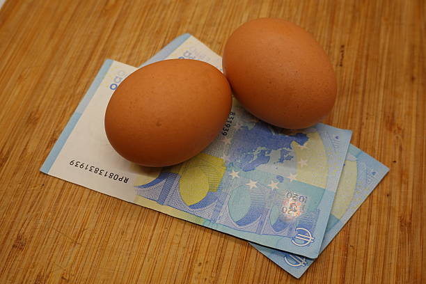 istock Rising egg prices symbolized by eggs on euro banknotes 2198775045