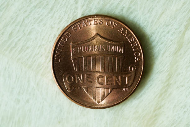 Graph showing stock market crash and 401(k) with cents in the background.