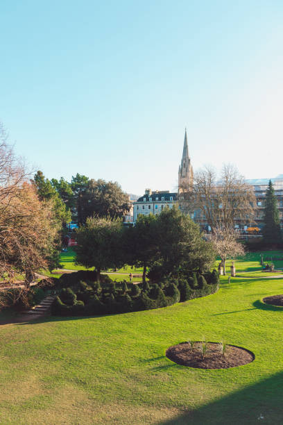 istock Parade gardens with bath abbey tower in background on sunny day 2198777283