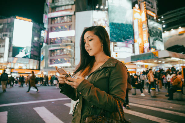 istock Young woman in Taipei at night 2198777380