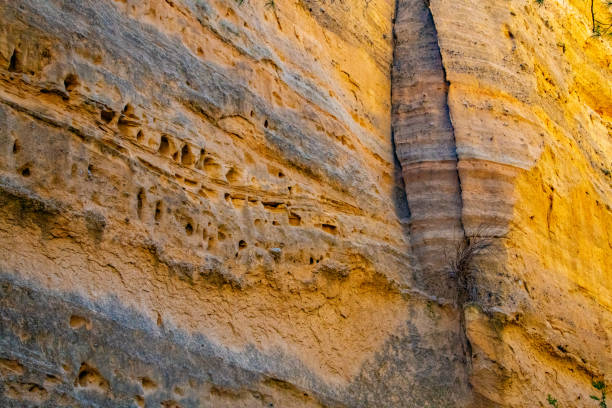 Slot Canyon featuring Cone shaped Tent Rocks -Multicolored rocks shaped like traditional native American tents. Kasha-Katuwe Tent Rocks National Monument in New Mexico, SW USA. Cochiti Pueblo New Mexico. the cone shaped tent rock formations are the products of volcanic eruptions.