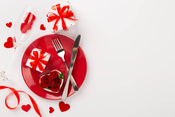 istock Table setting for Valentine's Day on color background, top view 2198777810