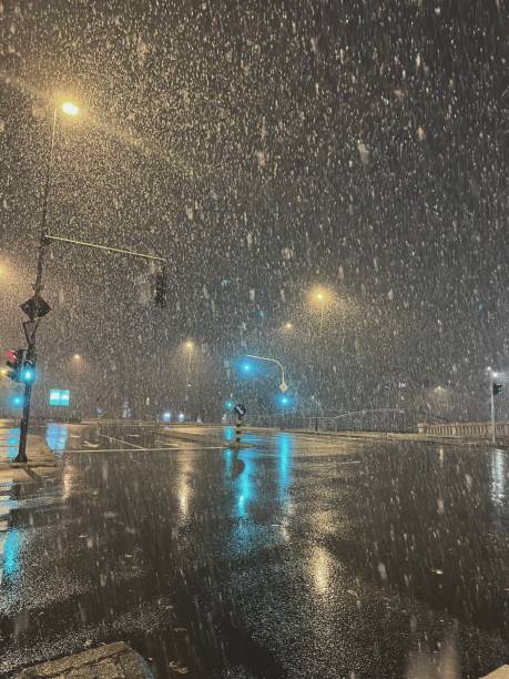 istock Snow on city crossroad 2198780429