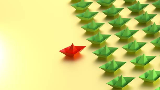 istock Paper ship and leadership metaphor. 2198781572