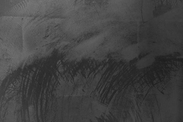 istock Abstract black and gray textured surface with brush strokes and patterns 2198786082