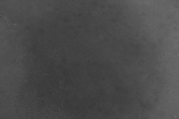Fine details of a textured surface showing various shades and subtle patterns
